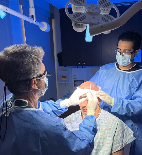 Award-winning physician performing a procedure